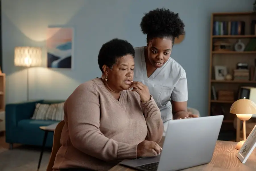 Home Health Care Patient Viewing Accessible Home Care Website Design with Provider